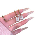 Two Tone Textured Teardrop Huggie Earrings With Decorative Details view 5