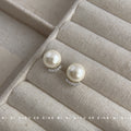 Cream Pearl Stud Earrings With Silver Crescent Pavé Base view 1