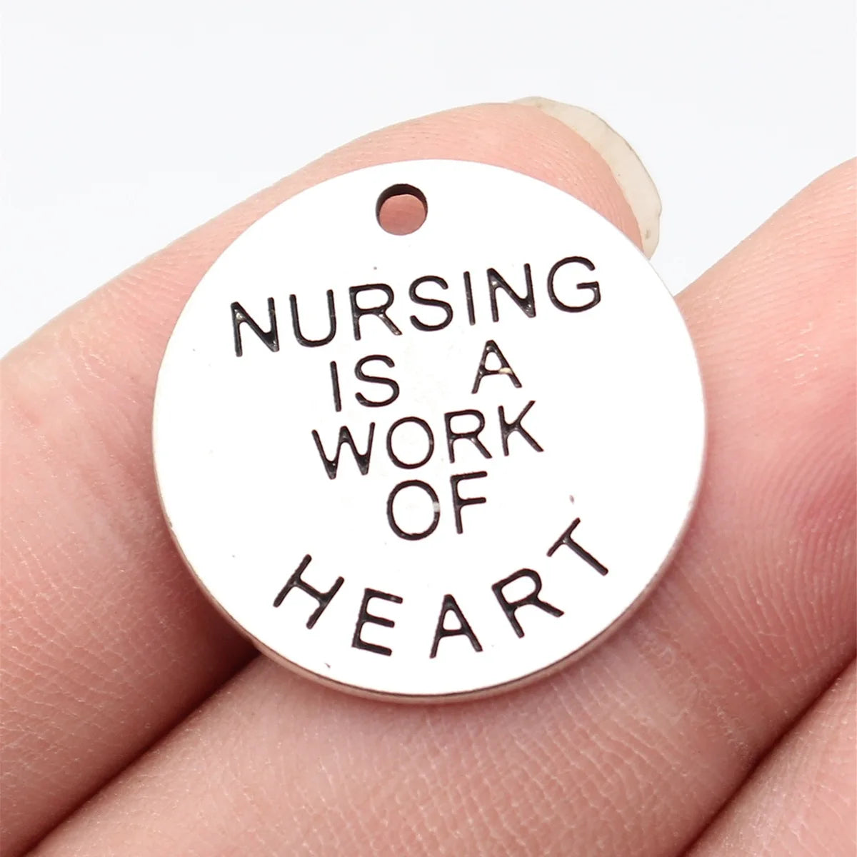 25x25x1.5mm 4.2g Antique Silver Zinc Alloy Nursing Is A Work Of Heart Round Tag Charm Pendant for DIY Jewelry