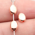 7.7x5.9x3.8mm 0.6g Rose Gold Zinc Alloy Oval Flat Spacer Round Beads for DIY Bracelet and Necklace Making