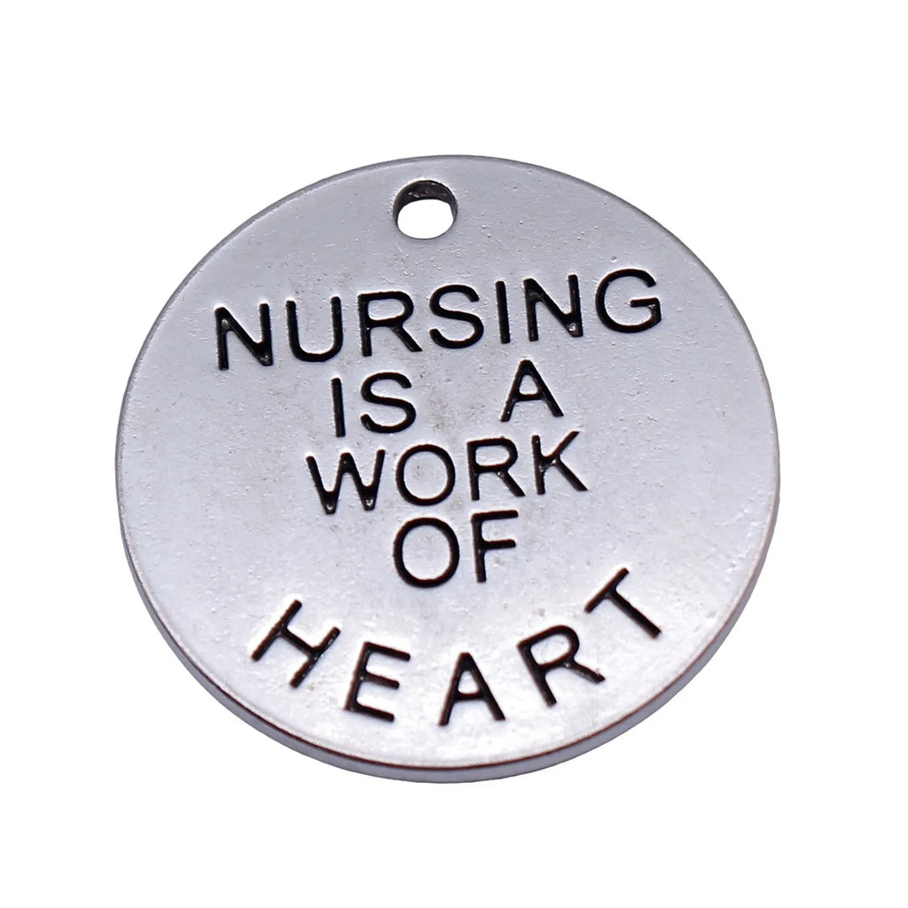 25x25x1.5mm 4.2g Antique Silver Zinc Alloy Nursing Is A Work Of Heart Round Tag Charm Pendant for DIY Jewelry
