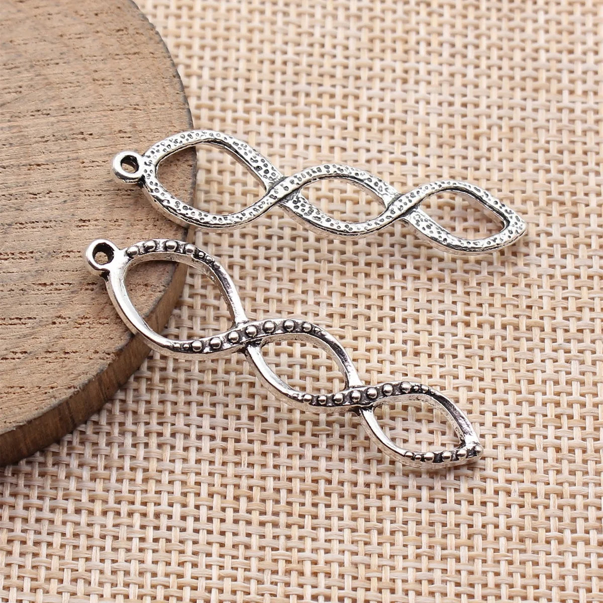 46x12mm 2.1g Antique Silver Zinc Alloy Hollow Spiral Infinity Symbol Charm Pendant for DIY Jewelry Making
