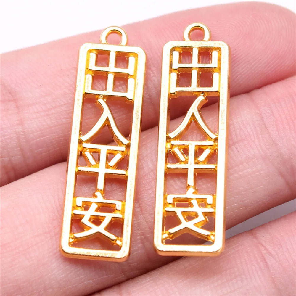 35x10mm 2.7g Bright Gold Zinc Alloy Safe Travel Word Plaque Charm Pendant for Chinese Style Jewelry Making