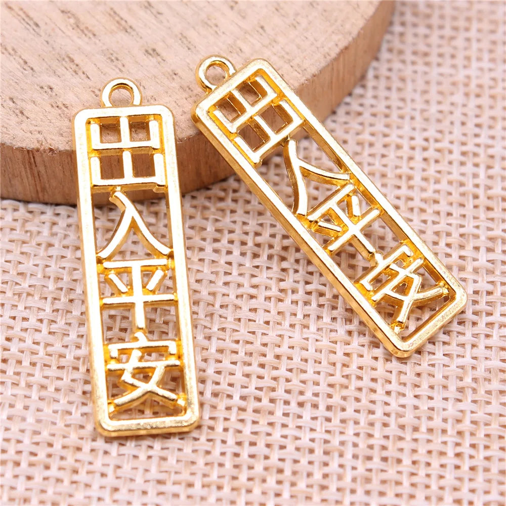 35x10mm 2.7g Bright Gold Zinc Alloy Safe Travel Word Plaque Charm Pendant for Chinese Style Jewelry Making