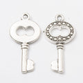 Ornate Skeleton Key Charm in Antique Bronze and Silver Tone view 7