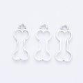 Open Dog Bone Metal Charm Pendant in Four Finishes view 8