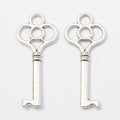 Four Loop Skeleton Key Metal Charms in Two Finishes view 6