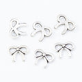 Tiny Bow Metal Jewelry Component in Five Pictured Finishes view 10