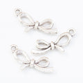 Slim Bow Knot Pendant Charm in Two Antique Finishes view 6