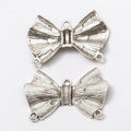 Textured Bow Metal Connector Charms in Three Finishes view 8