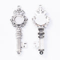 Ornate Key Shaped Round Bezel Settings in Three Finishes view 8
