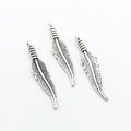 Slender Feather Metal Charms in Six Antique Finishes view 11
